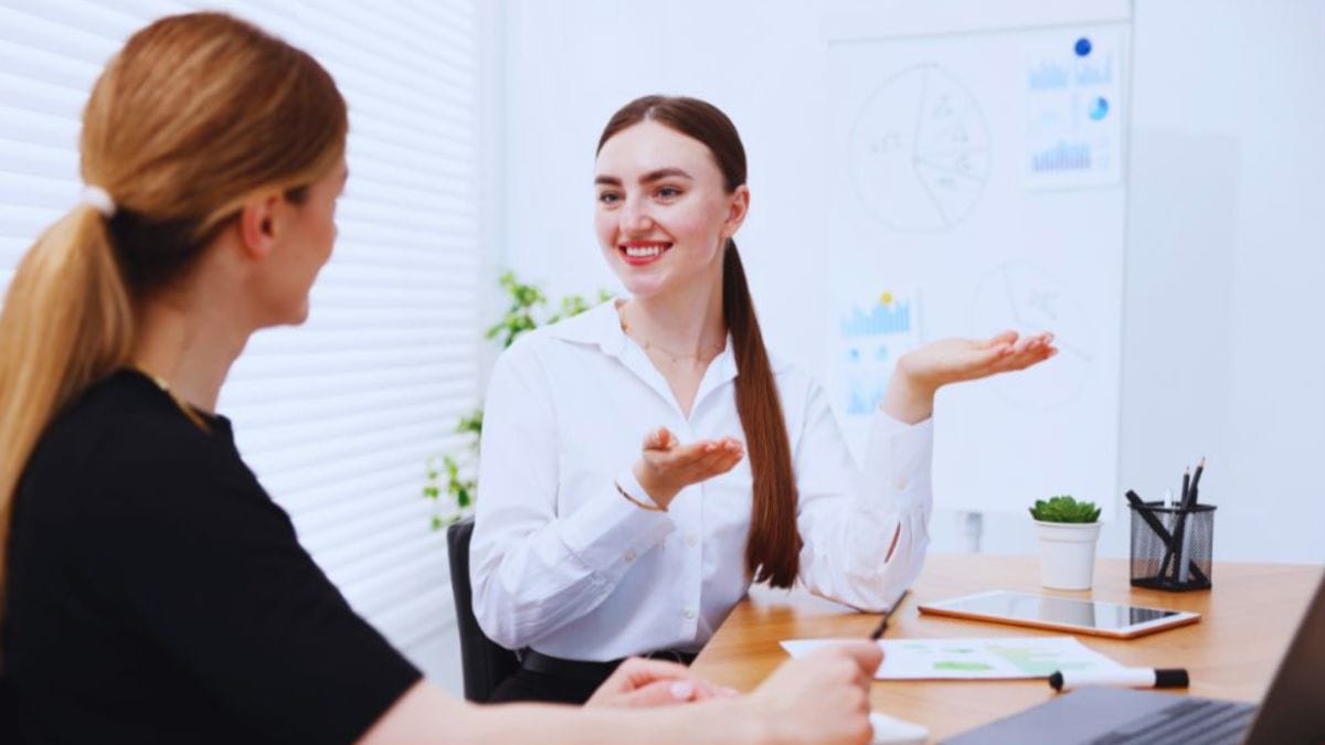 Signs You’re Ready for a Career Change and How Career Coaching in Temecula, CA Can Help You Find Fulfillment 1 Career coaching session in Temecula, CA, with two women using visual tools to guide career transitions.